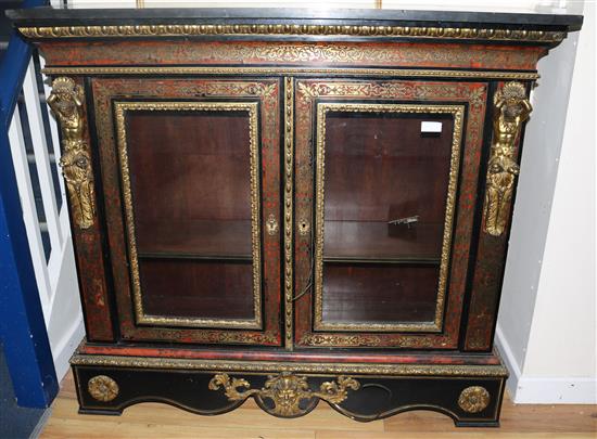 A 19th century French boulle work bookcase, with marble top and ormolu mounts, W.131cms